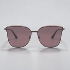 Studio photo of AvilaDubee DB7242 oversized cat eye sunglasses, deep brown stainless steel frame soft plum gradient UV400 nylon lenses luxury fashion women’s vacation eyewear