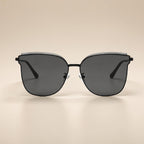AvilaDubee DB7242 unisex oversized cat eye sunglasses main product shot, matte black lightweight stainless steel frame classic grey anti-glare UV400 gradient nylon lenses white background studio photo