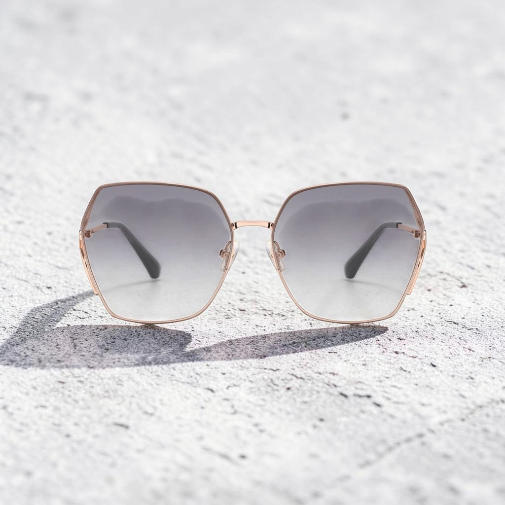 AvilaDubee DB7258 rose gold square sunglasses with mist grey gradient UV400 lenses placed on textured concrete background, chic minimalist women fashion sunglasses for photoshoots