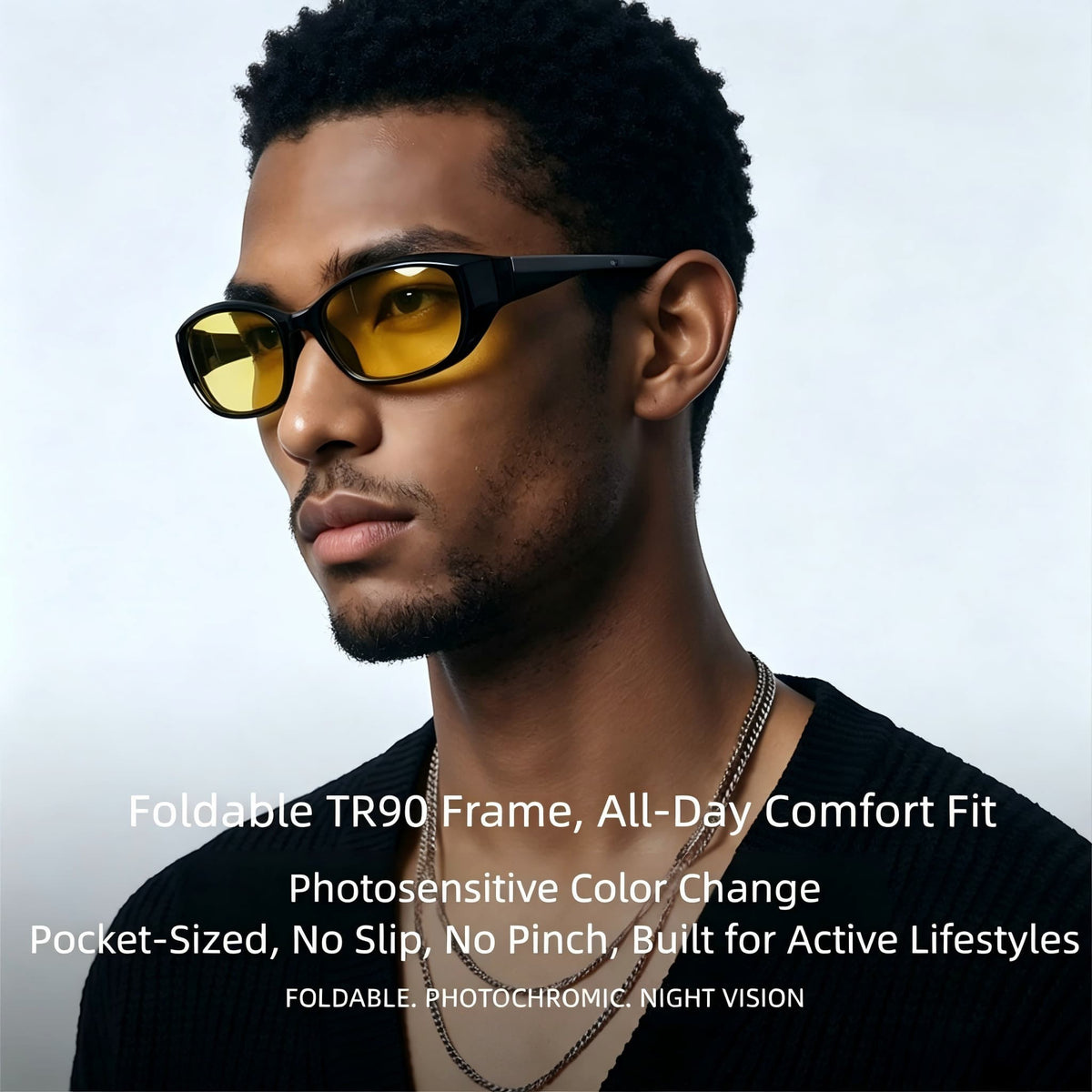 Male model wearing AvilaDubee JL8889 foldable TR90 photochromic day night polarized sunglasses, yellow night vision lenses anti-slip fit for active outdoor cycling travel lifestyle shot