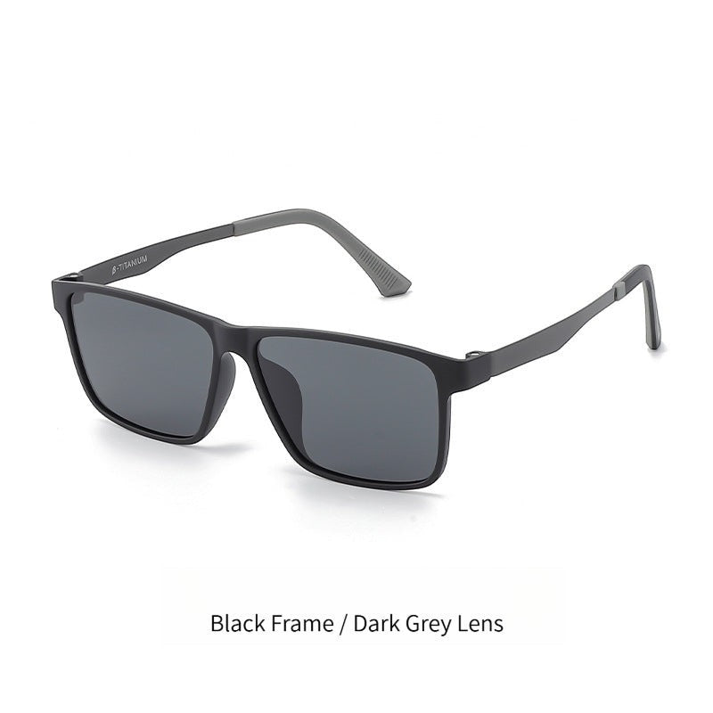 AvilaDubee YJ6660 men business sunglasses variant, matte black full plastic frame paired with dark grey UV400 TAC polarized lenses, flexible β-titanium temples white background studio photo