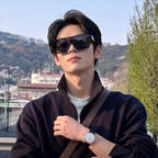 Young asian male model wearing AvileDubee HB80385 black shield sunglasses, outdoor city mountain background casual jacket streetwear fashion photography