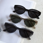 Flat lay banner of 3 color options retro cat eye polarized sunglasses, black, khaki & clear grey frames women fashion eyewear collection